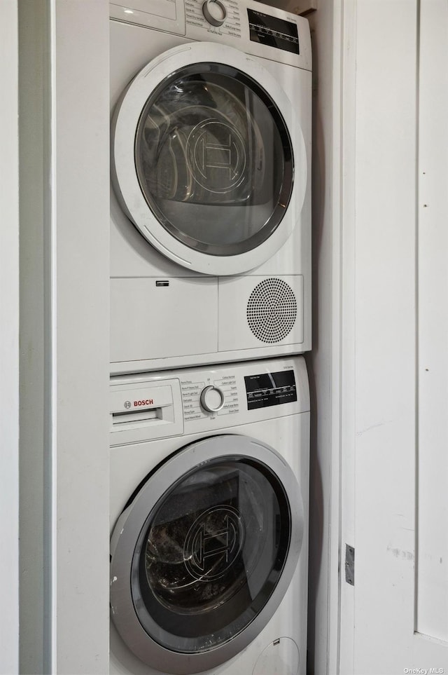 21-16 35th St Unit 5B, Astoria, NY 11105 - laundry room featuring stacked washer / drying machine