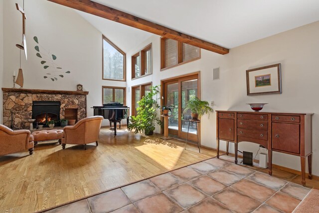 20 Old Farm Ln, Garrison, NY 10524 - living room with beamed ceiling, wood finished floors, a fireplace, and high vaulted ceiling
