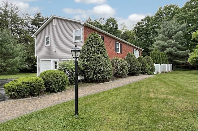 20 Shale Dr, Wappingers Falls, NY 12590 - view of property exterior with an attached garage
