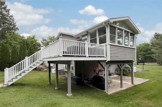 20 Shale Dr, Wappingers Falls, NY 12590 - rear view of house with stairway, a patio area, a lawn, a sunroom, and a deck