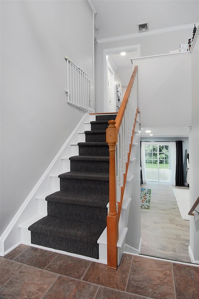 20 Shale Dr, Wappingers Falls, NY 12590 - staircase with ornamental molding, baseboards, and stone tile flooring