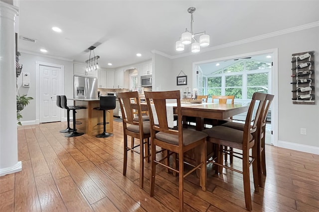 20 Shale Dr, Wappingers Falls, NY 12590 - dining room with ornamental molding, baseboards, light wood-type flooring, a chandelier, and recessed lighting