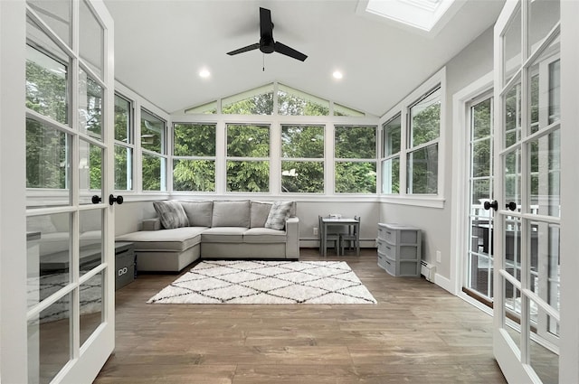 20 Shale Dr, Wappingers Falls, NY 12590 - sunroom / solarium featuring a skylight, vaulted ceiling, a wooden deck, french doors, and wood finished floors