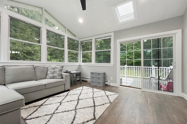 20 Shale Dr, Wappingers Falls, NY 12590 - sunroom featuring a skylight, lofted ceiling, and baseboard heating