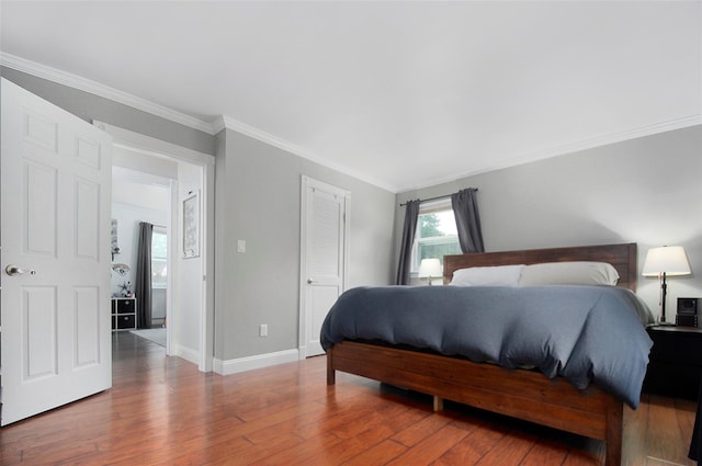20 Shale Dr, Wappingers Falls, NY 12590 - bedroom with wood finished floors, crown molding, baseboards, and a closet