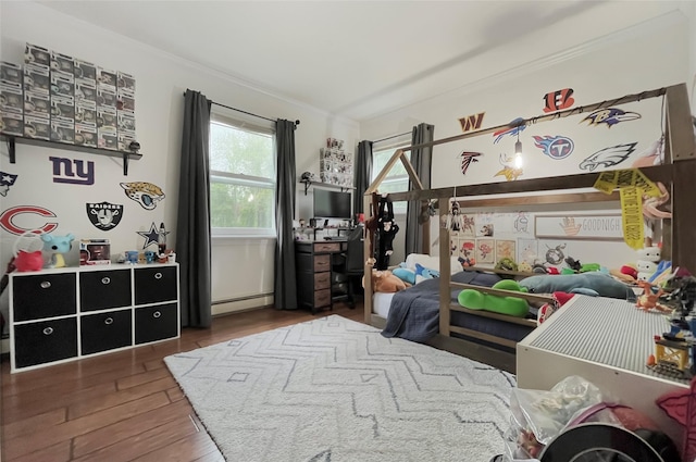 20 Shale Dr, Wappingers Falls, NY 12590 - bedroom with baseboard heating, ornamental molding, and wood finished floors
