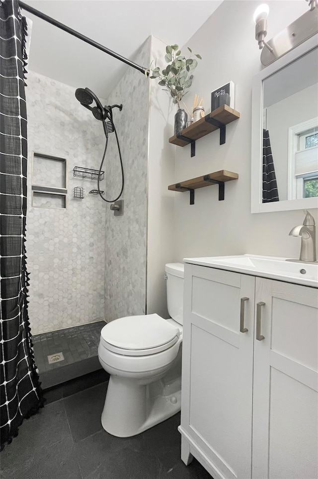 20 Shale Dr, Wappingers Falls, NY 12590 - bathroom with a tile shower, toilet, and vanity