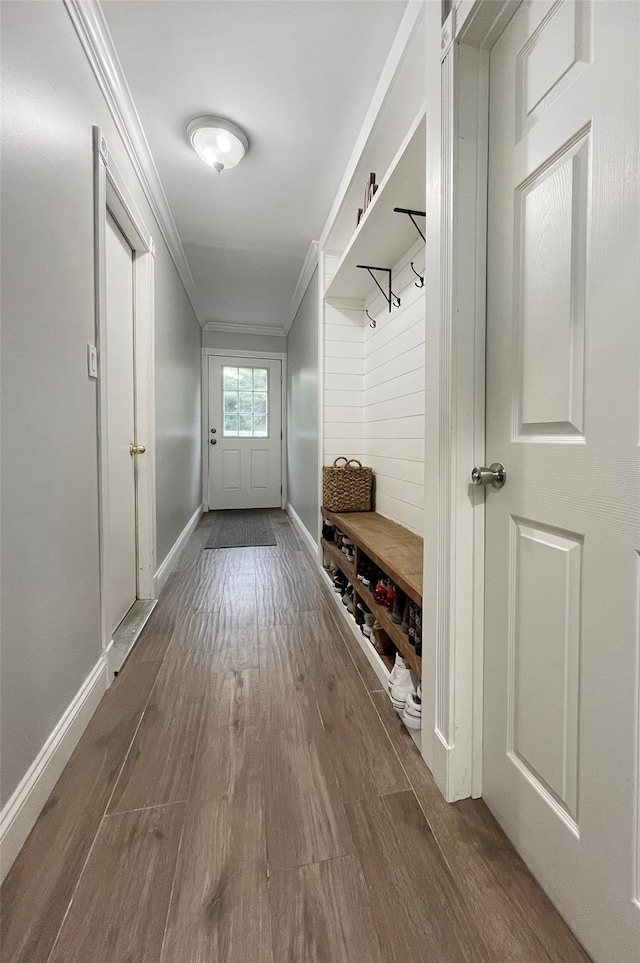 20 Shale Dr, Wappingers Falls, NY 12590 - mudroom featuring ornamental molding, wood finished floors, and baseboards