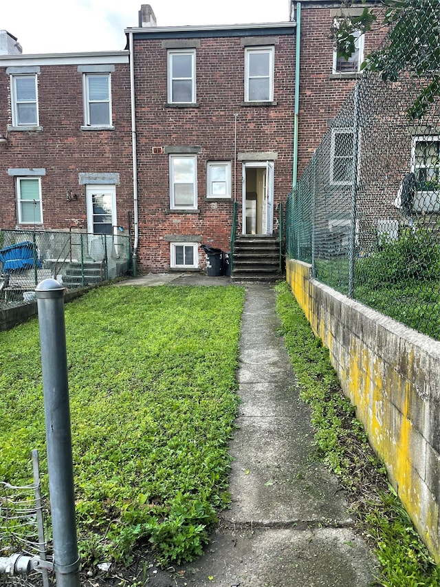 32 Moquette Row S, Yonkers, NY 10703 - view of front of house featuring entry steps and brick siding