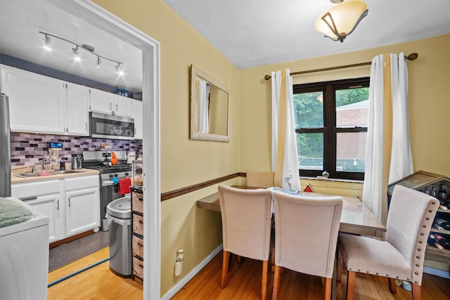 35 Lawrence Dr Unit A, White Plains, NY 10603 - dining space featuring light wood-style floors and baseboards