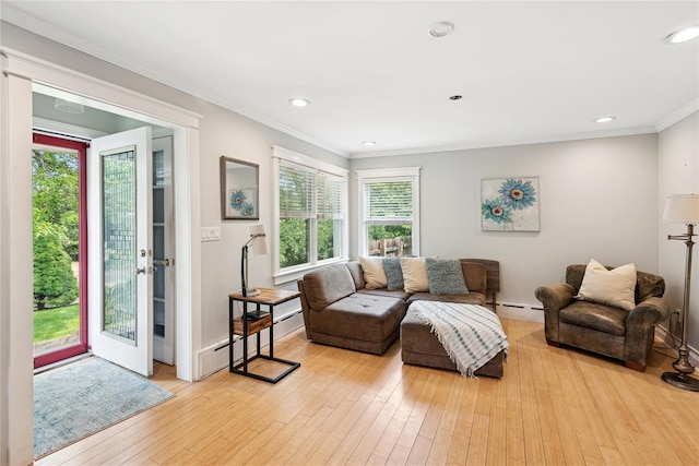 17 Tulip Rd, Rocky Point, NY 11778 - living area featuring a baseboard heating unit, ornamental molding, light wood-style flooring, and recessed lighting