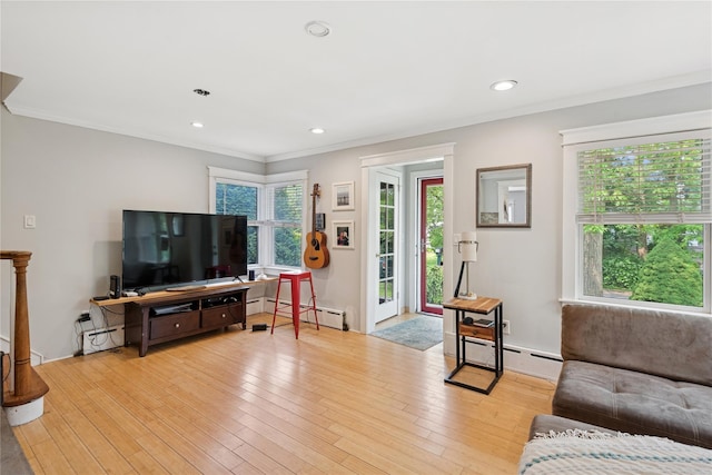 17 Tulip Rd, Rocky Point, NY 11778 - living room with ornamental molding, light wood-type flooring, a baseboard heating unit, baseboard heating, and recessed lighting