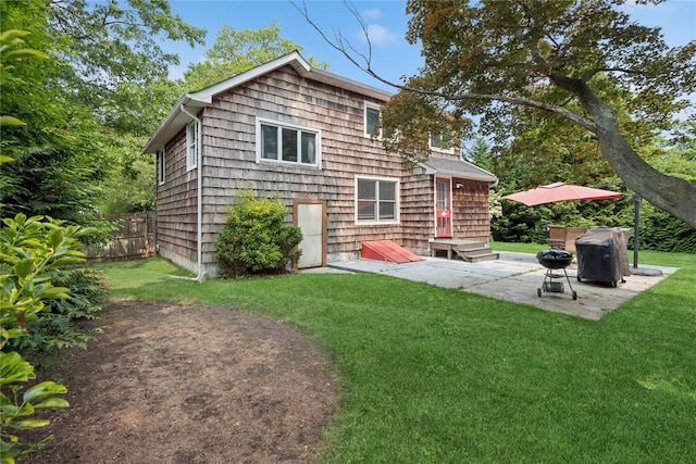 17 Tulip Rd, Rocky Point, NY 11778 - rear view of property with a patio and entry steps