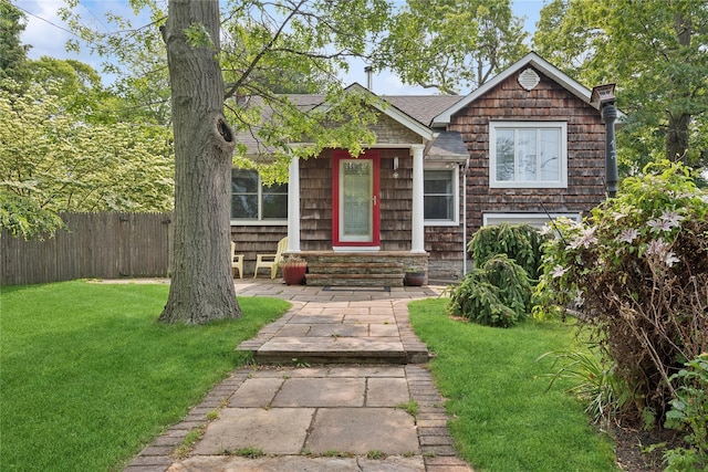 17 Tulip Rd, Rocky Point, NY 11778 - view of front of property featuring a shingled roof