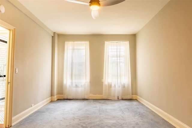 8 Barstow Rd Unit 4F, Great Neck, NY 11021 - carpeted spare room featuring baseboards, a ceiling fan, and a smoke detector