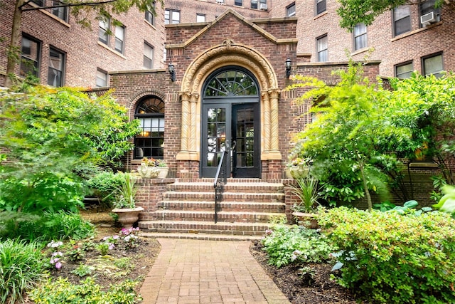 8 Barstow Rd Unit 4F, Great Neck, NY 11021 - entrance to property featuring french doors and brick siding