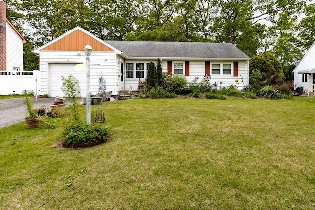 56 Magro Dr, North Babylon, NY 11703 - view of front of home featuring asphalt driveway and a garage