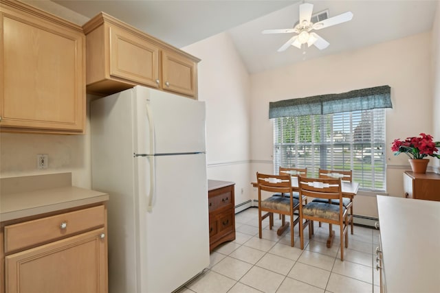 30 Joyces Way, Bay Shore, NY 11706 - kitchen featuring freestanding refrigerator, baseboard heating, light brown cabinetry, and light tile patterned floors