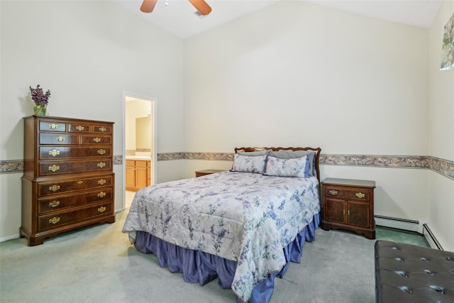 30 Joyces Way, Bay Shore, NY 11706 - carpeted bedroom featuring vaulted ceiling, a ceiling fan, ensuite bathroom, and a baseboard heating unit