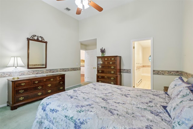 30 Joyces Way, Bay Shore, NY 11706 - carpeted bedroom featuring connected bathroom, a towering ceiling, ceiling fan, and a baseboard radiator