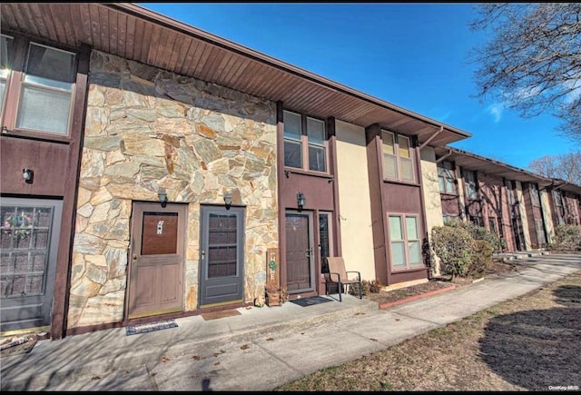 2 Birch Ct Unit 2, Selden, NY 11784 - property entrance with stone siding and stucco siding