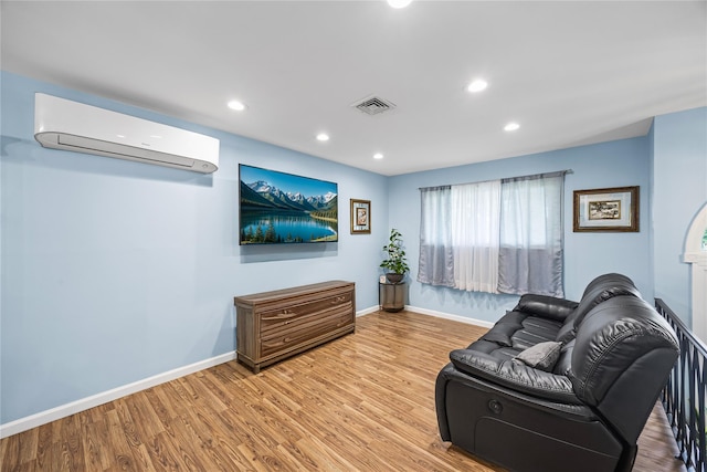24 Sugarwood Ln, Commack, NY 11725 - living room with a wall mounted AC, wood finished floors, baseboards, and recessed lighting