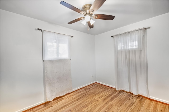 24 Sugarwood Ln, Commack, NY 11725 - empty room featuring wood finished floors, ceiling fan, and baseboards