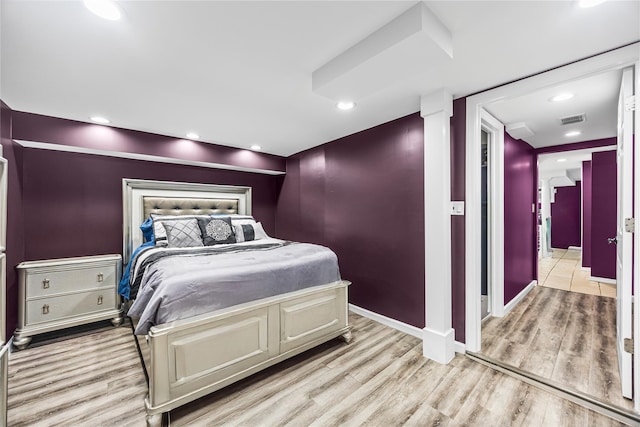 24 Sugarwood Ln, Commack, NY 11725 - bedroom with light wood-type flooring, baseboards, and recessed lighting