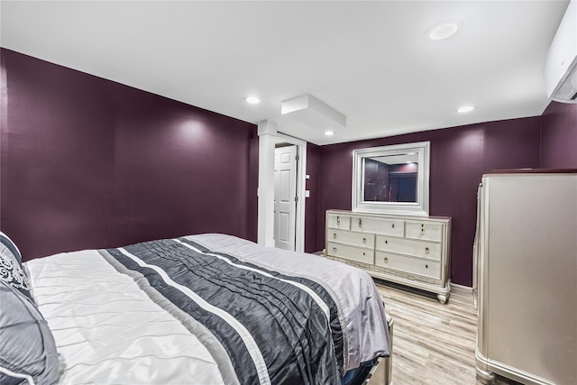 24 Sugarwood Ln, Commack, NY 11725 - bedroom with light wood finished floors, baseboards, recessed lighting, and freestanding refrigerator