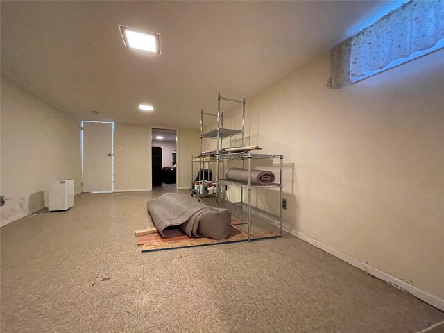 42 Saint Marks Ave, Freeport, NY 11520 - garage featuring baseboards
