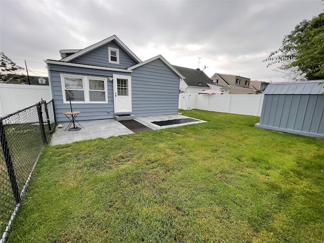 42 Saint Marks Ave, Freeport, NY 11520 - back of property featuring a patio