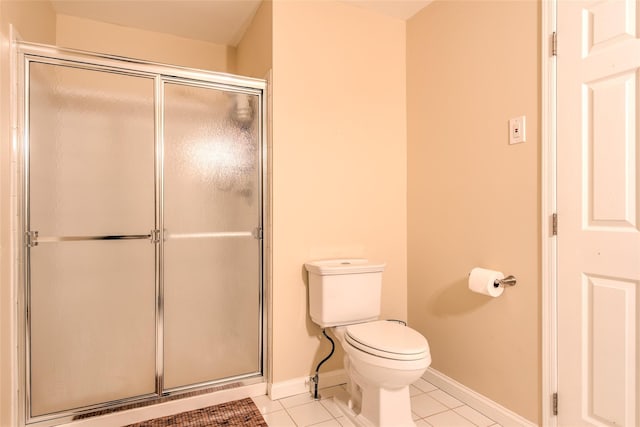 17 Gettysburg Dr Unit 17, Port Jefferson Station, NY 11776 - full bathroom with tile patterned flooring, a shower with shower door, baseboards, and toilet