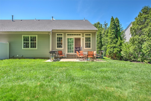 17 Gettysburg Dr Unit 17, Port Jefferson Station, NY 11776 - rear view of house with a patio area and a yard