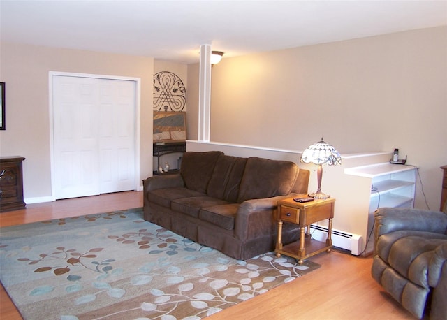 263 River Ave Unit 52, Patchogue, NY 11772 - living area with baseboard heating and wood finished floors