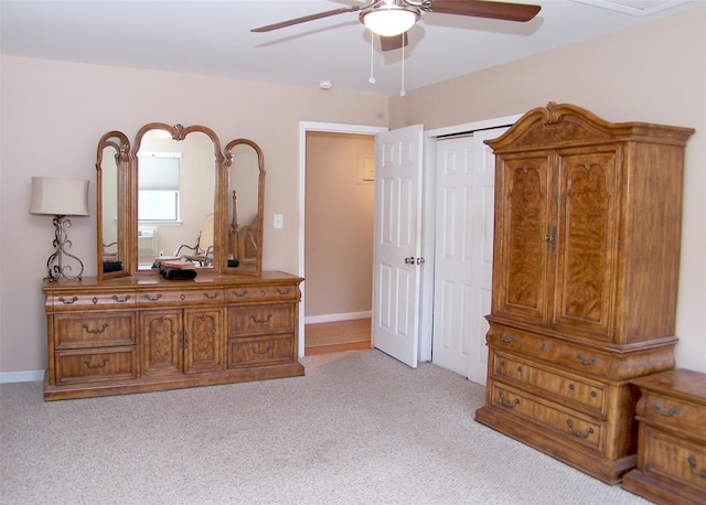 263 River Ave Unit 52, Patchogue, NY 11772 - bedroom featuring light carpet, ceiling fan, and baseboards