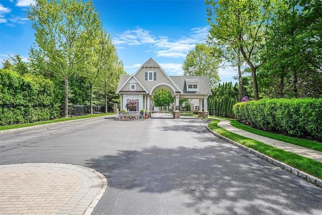 23 Sonata Ct, Lake Grove, NY 11755 - shingle-style home with curved driveway