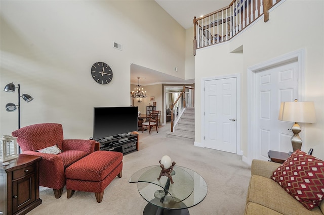 23 Sonata Ct, Lake Grove, NY 11755 - living room with light carpet, stairs, a chandelier, a high ceiling, and baseboards