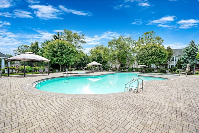 23 Sonata Ct, Lake Grove, NY 11755 - community pool featuring a gazebo and a patio area