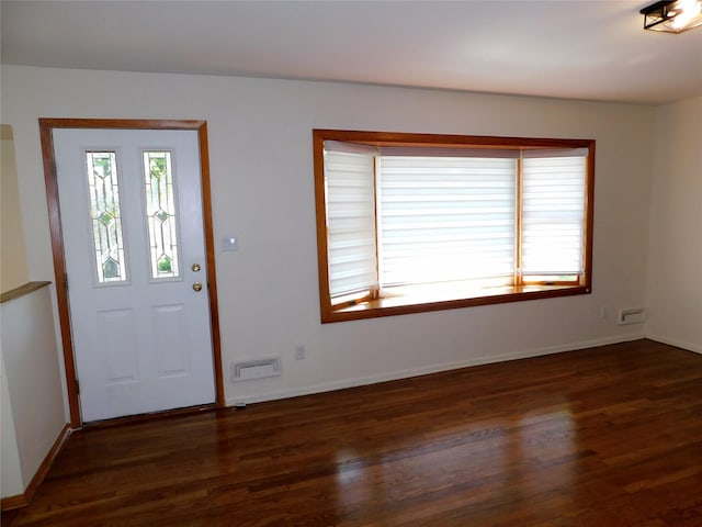 7 Audrey Ln, Commack, NY 11725 - foyer entrance with wood finished floors and baseboards