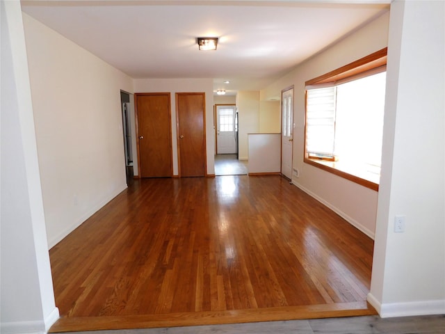 7 Audrey Ln, Commack, NY 11725 - empty room with wood finished floors and baseboards