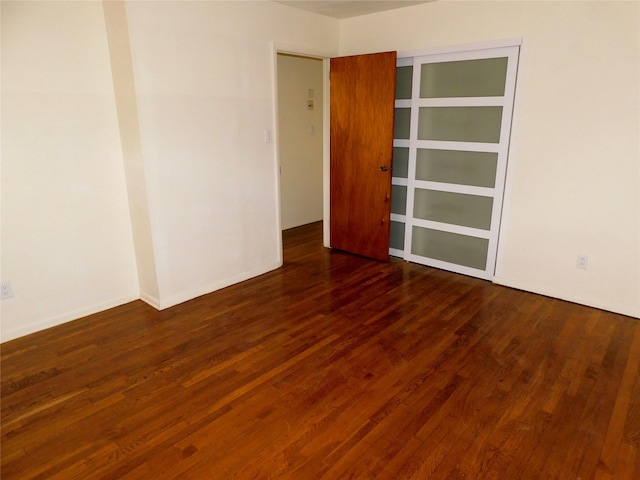 7 Audrey Ln, Commack, NY 11725 - spare room with wood finished floors