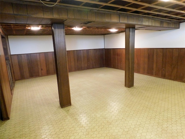 7 Audrey Ln, Commack, NY 11725 - finished basement with a wainscoted wall, wood walls, and tile patterned floors