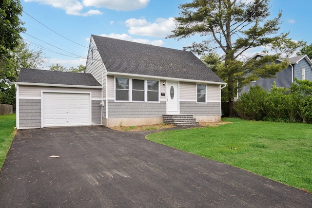17 21 St Ave, Bay Shore, NY 11706 - view of front of home with an attached garage, a shingled roof, a front lawn, entry steps, and driveway