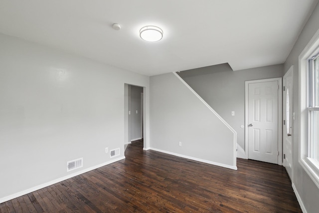 17 21 St Ave, Bay Shore, NY 11706 - spare room featuring dark wood finished floors, baseboards, stairs, and a smoke detector