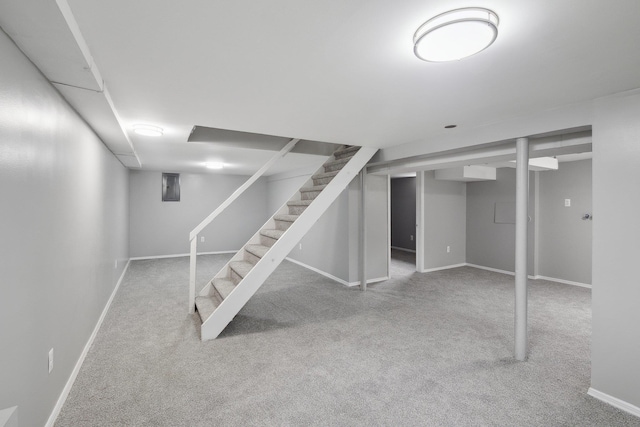 17 21 St Ave, Bay Shore, NY 11706 - finished basement with carpet flooring, baseboards, and stairway
