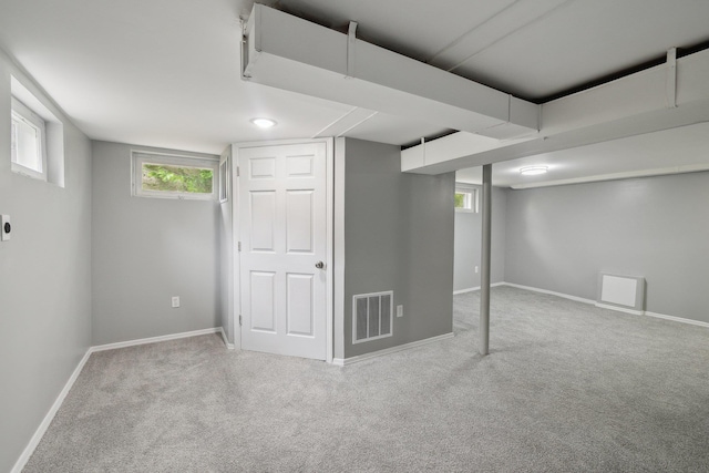 17 21 St Ave, Bay Shore, NY 11706 - below grade area with carpet flooring and baseboards