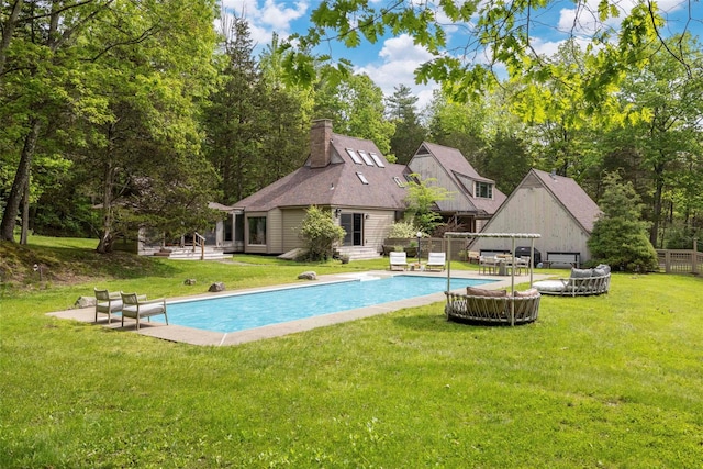 16 Juniper Ln, Woodstock, NY 12498 - outdoor pool featuring view of wooded area