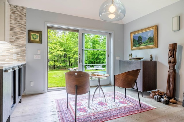 16 Juniper Ln, Woodstock, NY 12498 - dining room with light wood-style flooring and baseboards