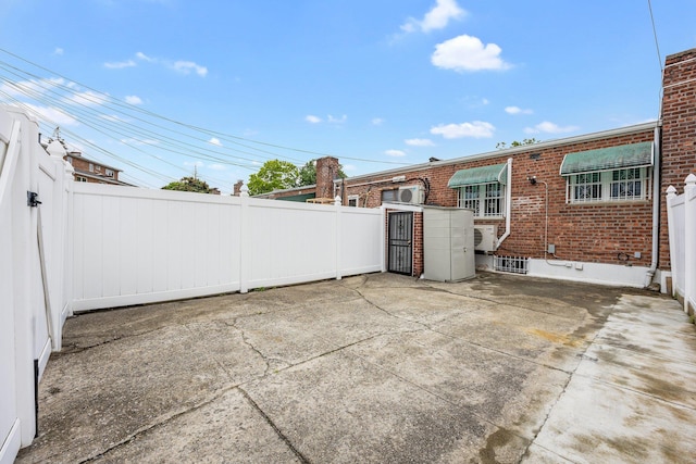 64-30 73rd Pl, Middle Village, NY 11379 - view of patio with a gate