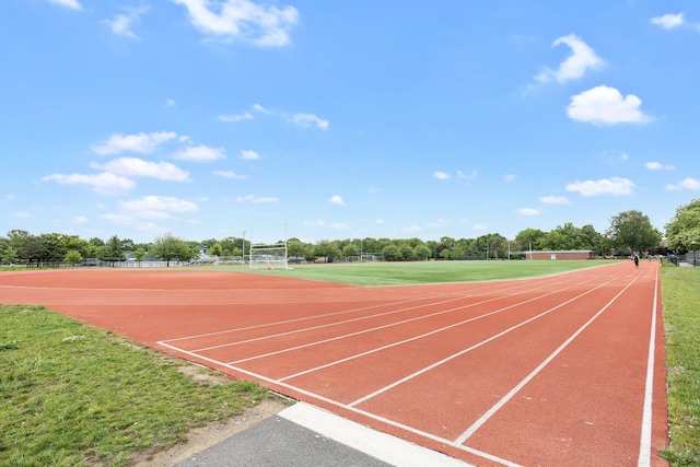 64-30 73rd Pl, Middle Village, NY 11379 - view of community with an area for soccer and view of wooded area
